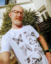 Load image into Gallery viewer, White t-shirt featuring a quirky bones and bugs design, perfect for alternative and spooky style lovers.
