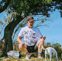 Load image into Gallery viewer, White t-shirt featuring a quirky bones and bugs design, perfect for alternative and spooky style lovers.
