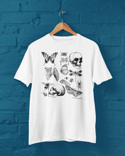 Load image into Gallery viewer, White t-shirt featuring a quirky bones and bugs design, perfect for alternative and spooky style lovers.
